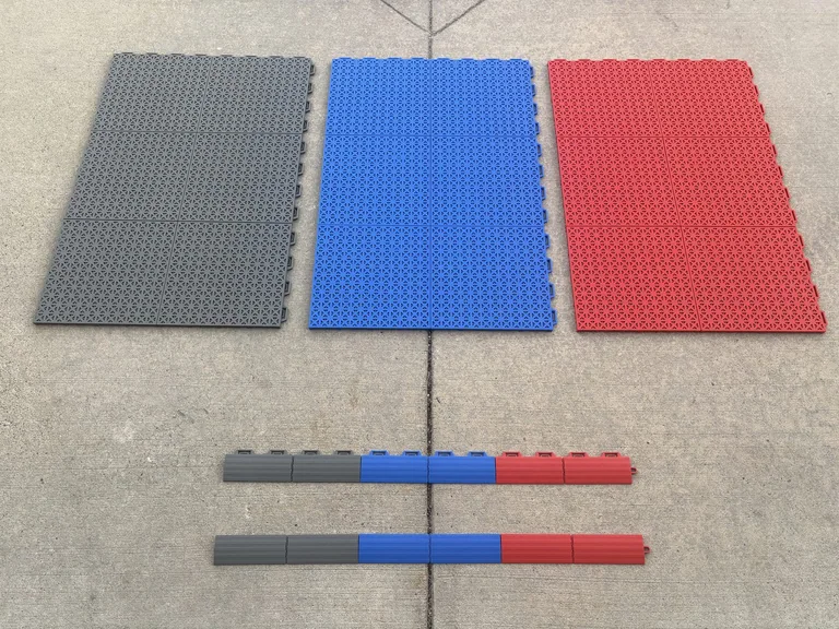 Dark grey, blue and red court tiles with matching edge strips and corners